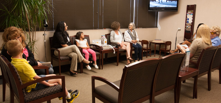 photo of people sitting in a clinic waiting area