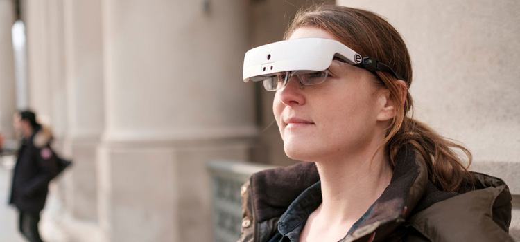 Woman wearing the eSight device