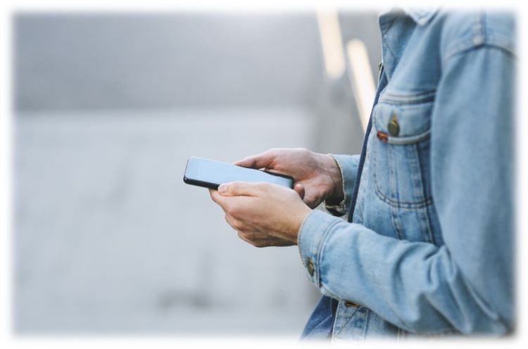 photo of a person holding a smartphone