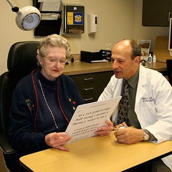 Doctor and Woman with vision chart